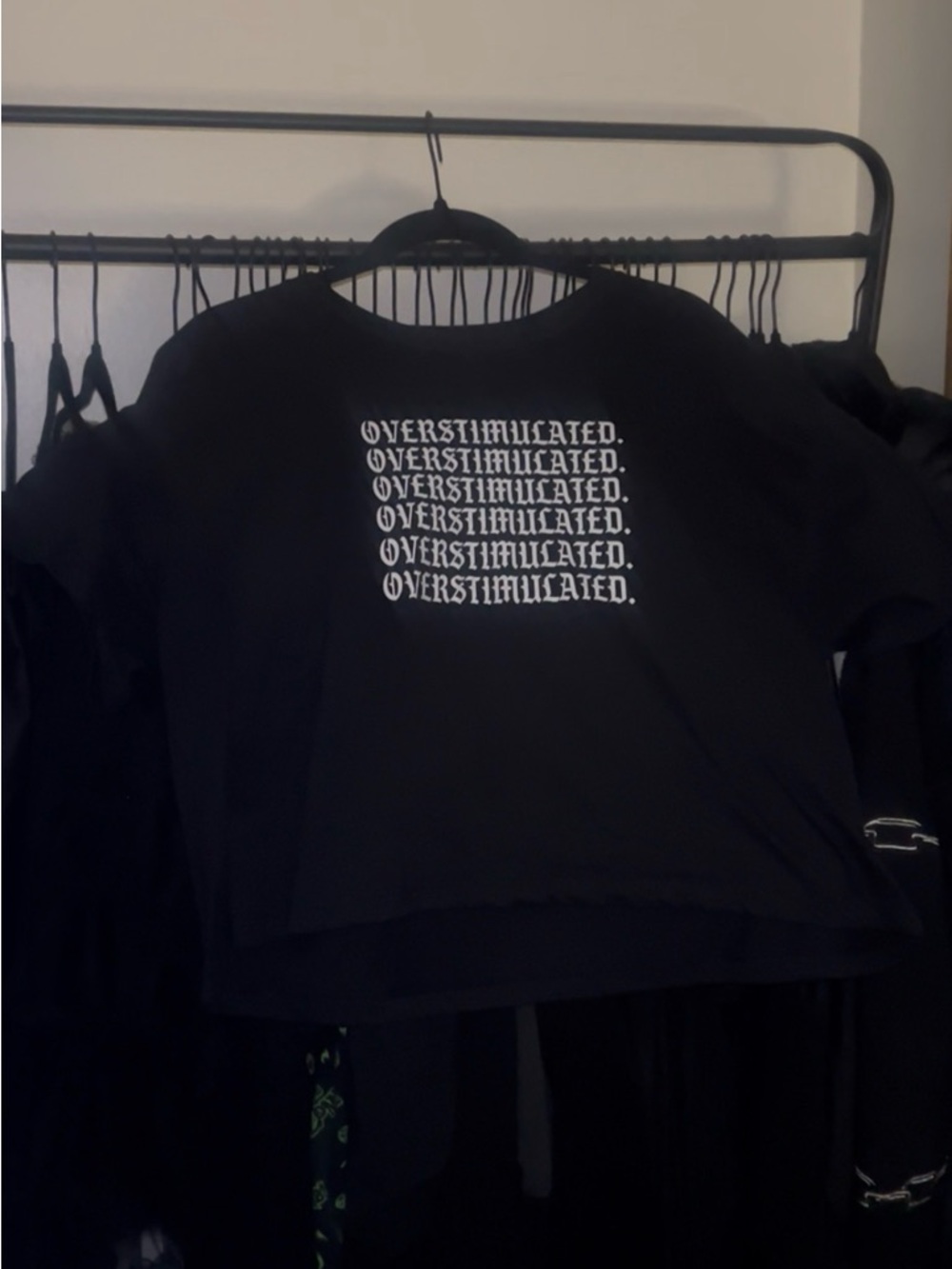 Seventh Eclectic Black Crop Top with "OVERSTIMULATED." Graphic